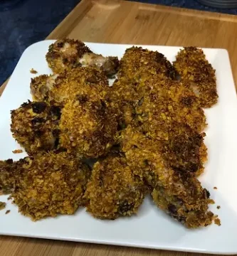 Alitas de pollo rebozadas y hechas al horno. Extra crujientes.