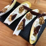 Endivias con roquefort, nueces y mango deshidratado.